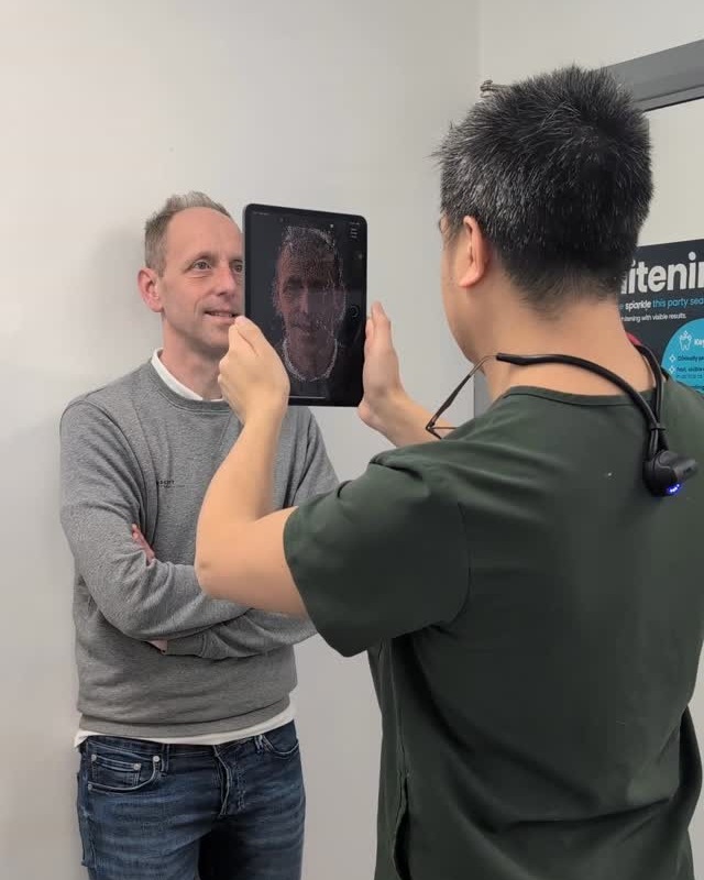 A patient's 3D facial scan shown on an iPad at the clinic